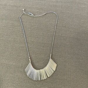 Gold colored necklace